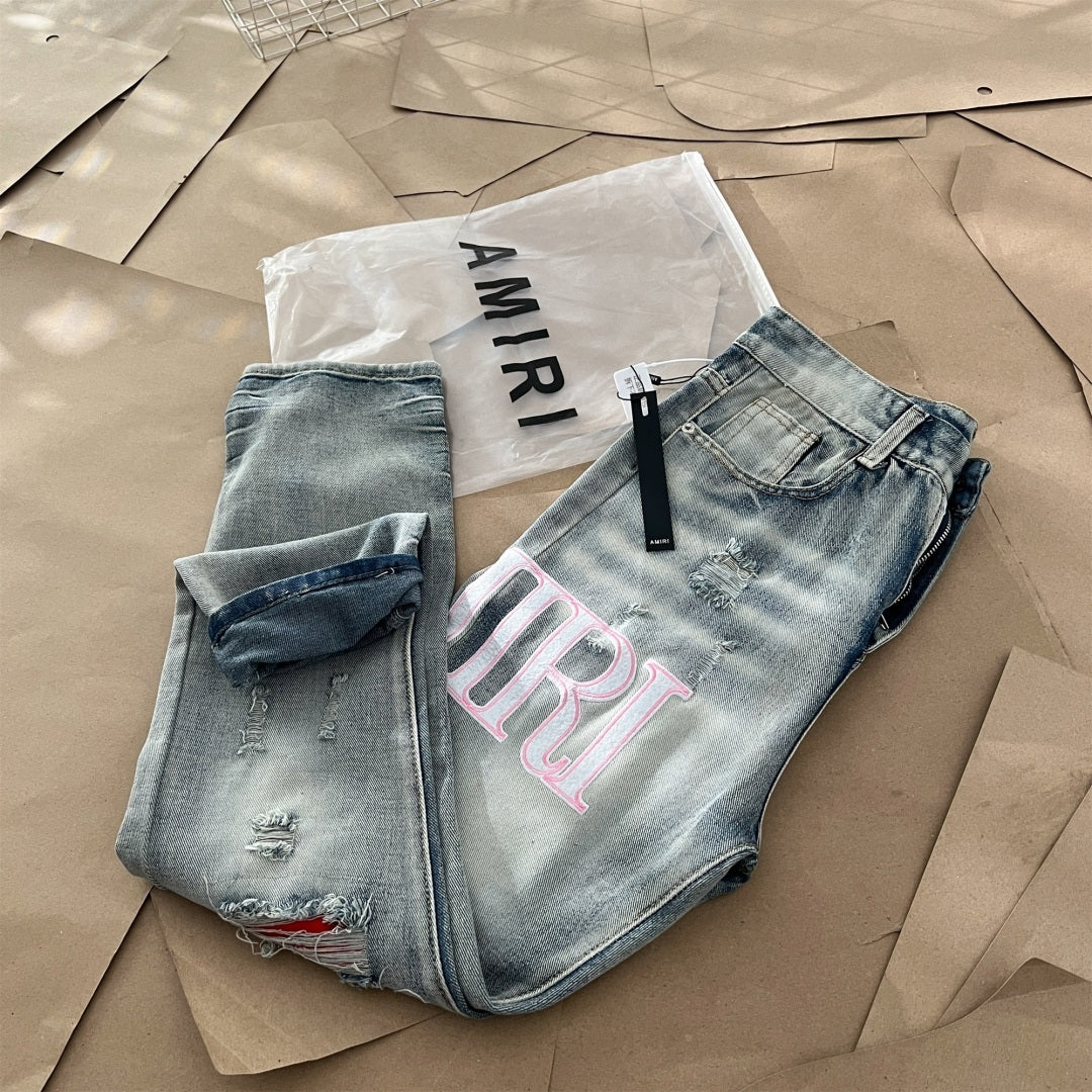 AMIRI Jeans Destroyed – Logo Rosa