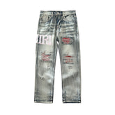 AMIRI Jeans Destroyed – Logo Rosa