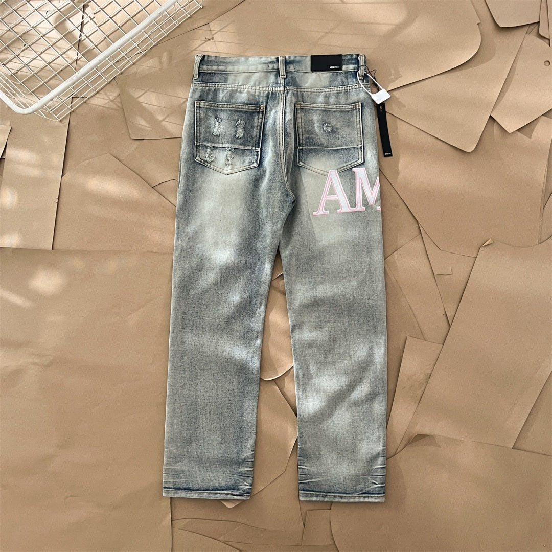 AMIRI Jeans Destroyed – Logo Rosa