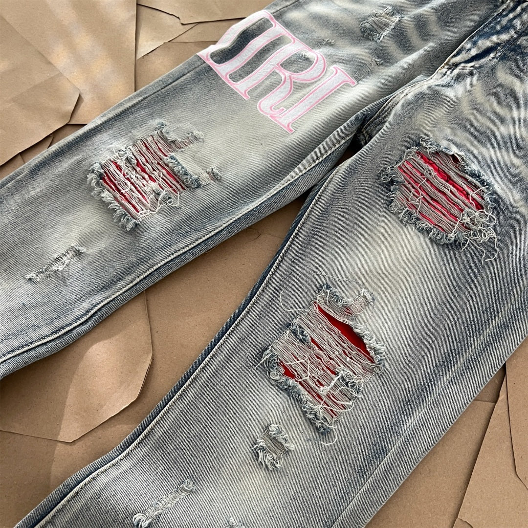 AMIRI Jeans Destroyed – Logo Rosa