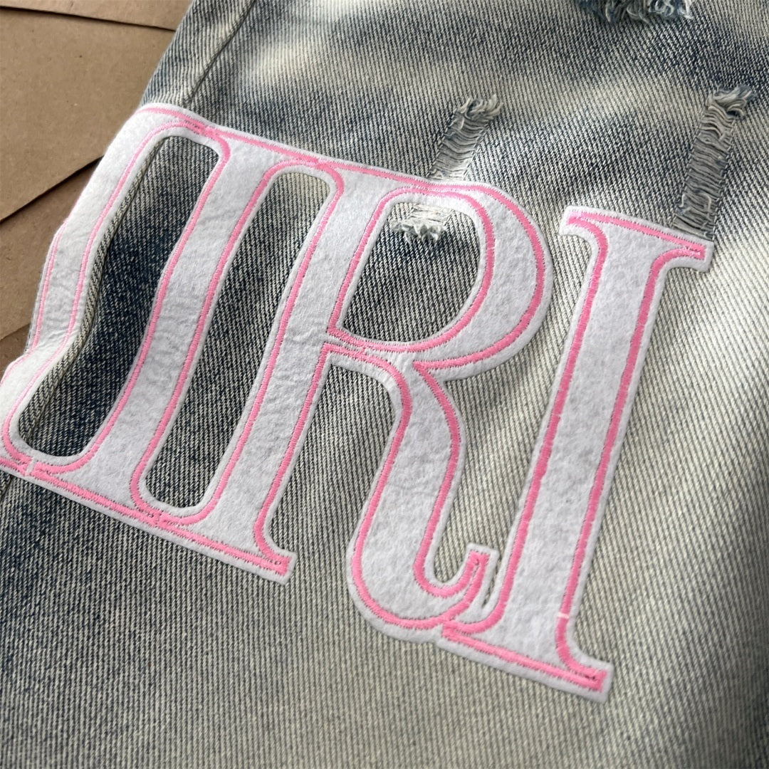 AMIRI Jeans Destroyed – Logo Rosa